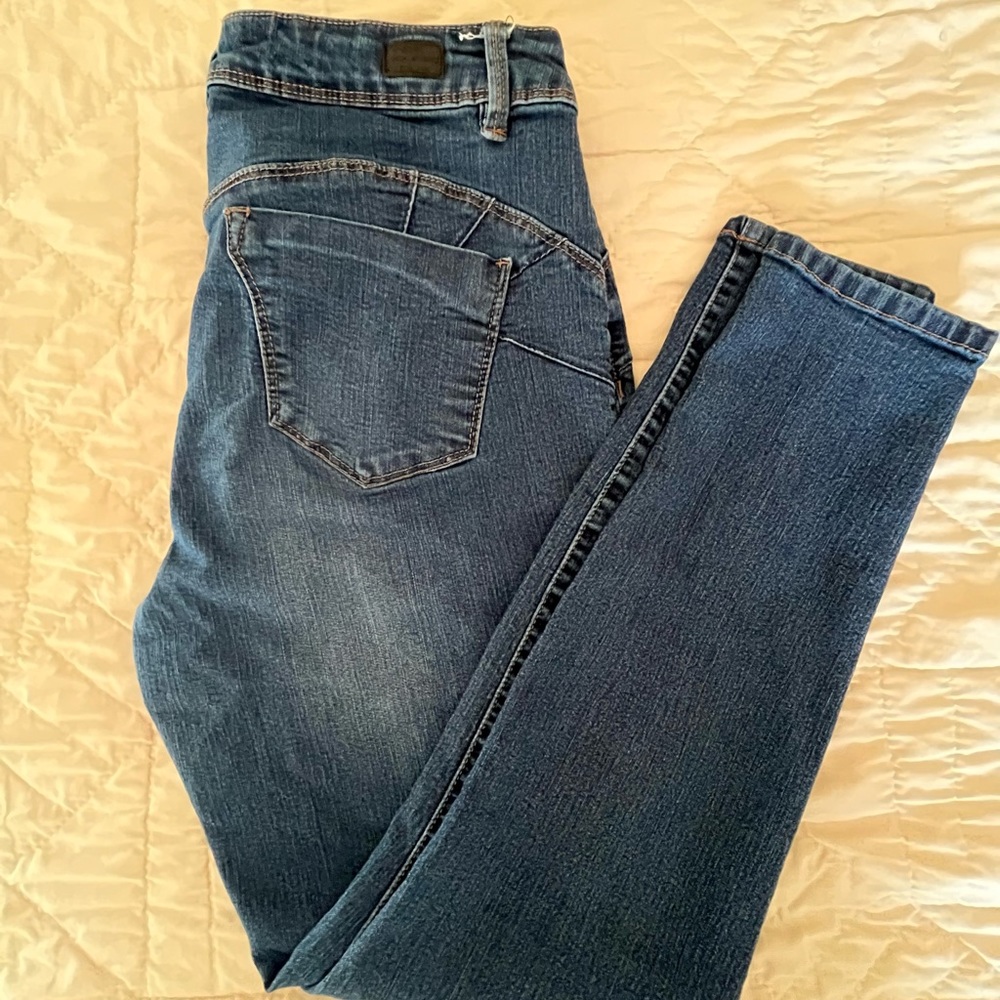 Miss poured in blue high rise skinny jeans